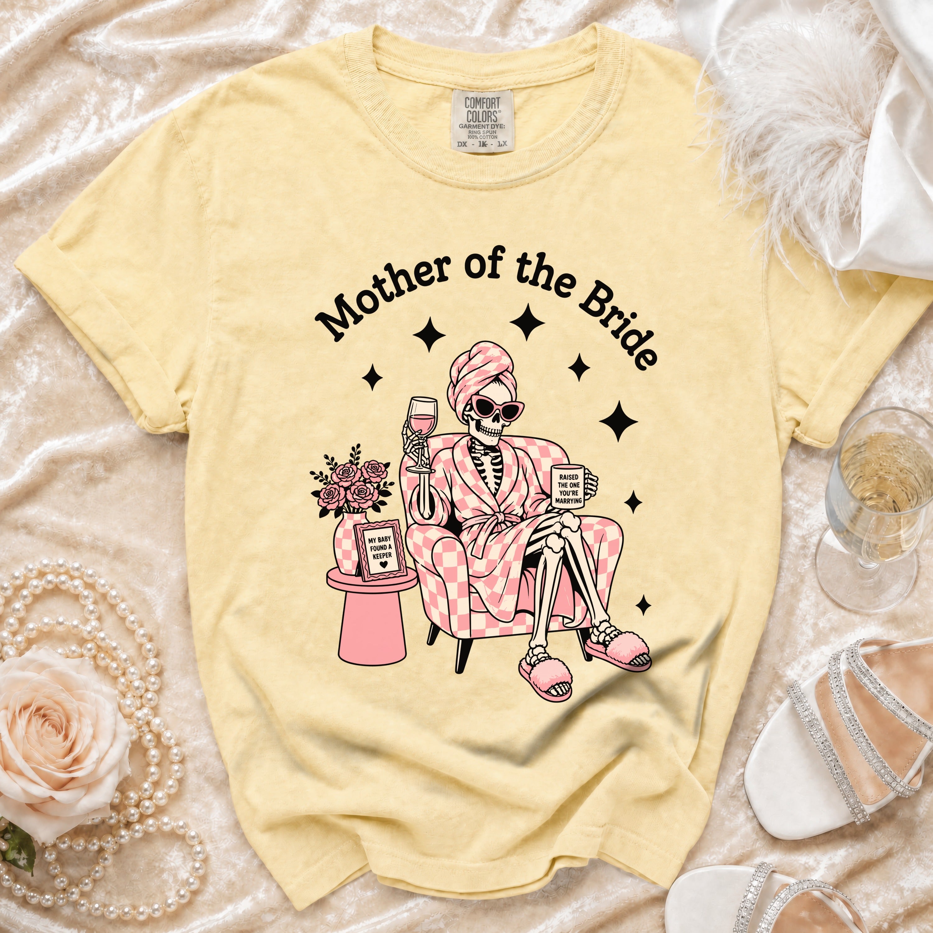 Yellow t-shirt with "Mother of the Bride" text and skeleton graphic.