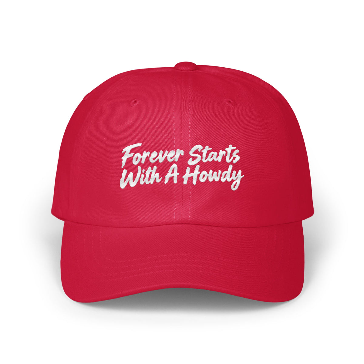 A bright red baseball cap embroidered with the white text Forever Starts With A Howdy.