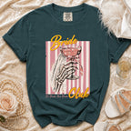 Dark teal t-shirt with "Bride Club" text and skeleton holding a drink graphic.