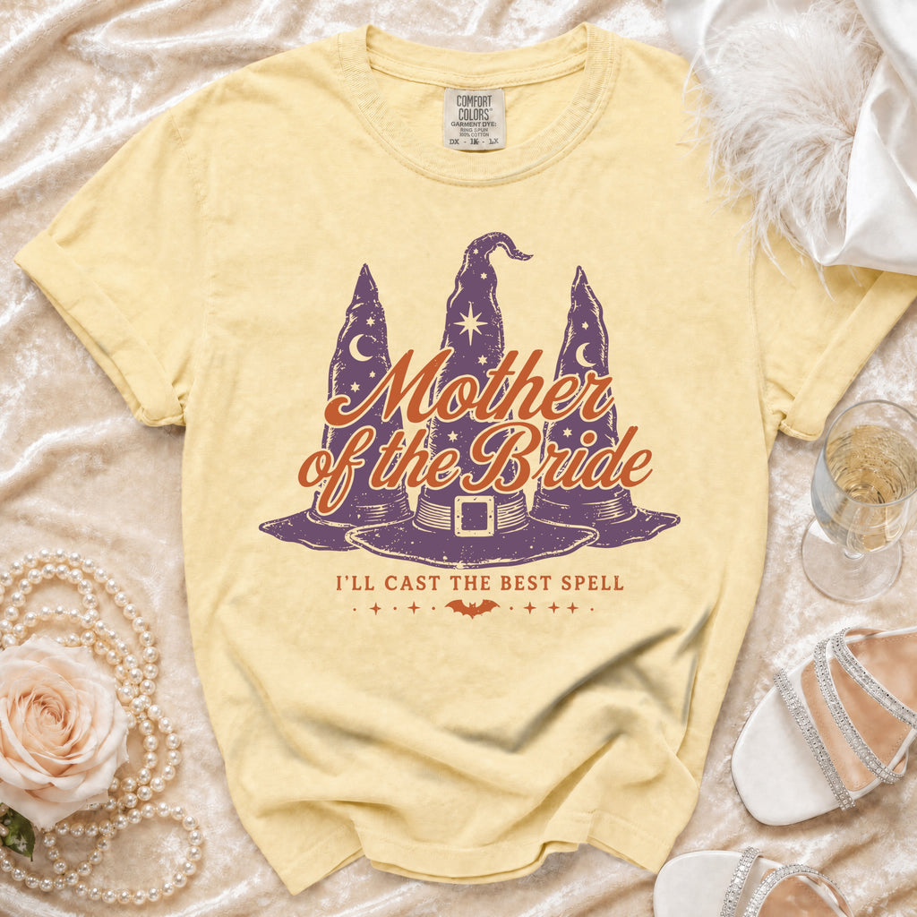 Yellow t-shirt with "Mother of the Bride" and witch hats graphic.