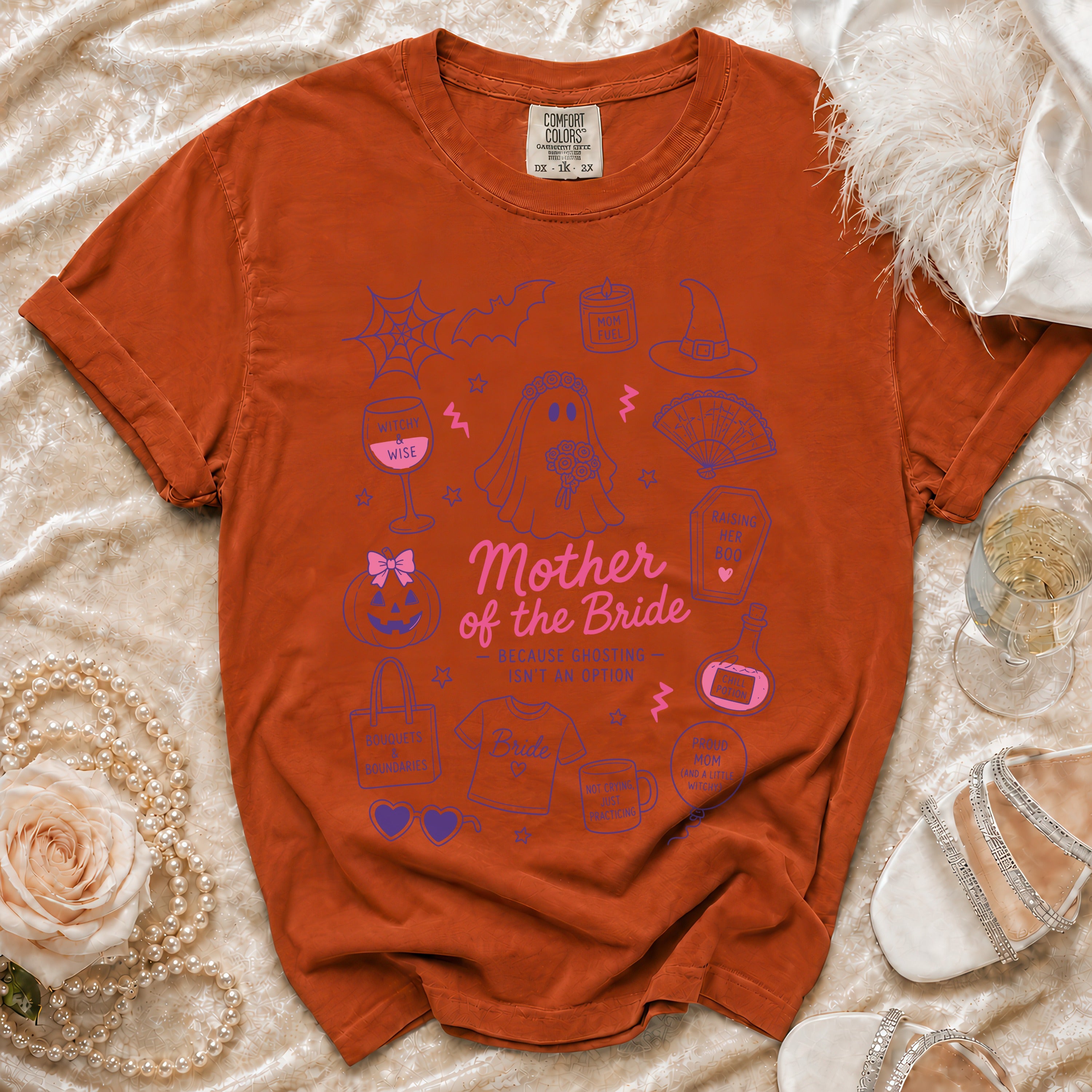 Orange t-shirt with "Mother of the Bride" and Halloween-themed doodles.