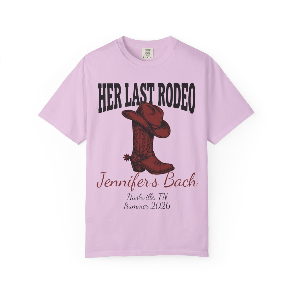 Pink t-shirt with "Her Last Rodeo" and cowboy boot graphic.