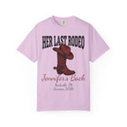 Pink t-shirt with "Her Last Rodeo" and cowboy boot graphic.