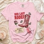 Pink t-shirt with "Her Last Rodeo" and cowboy boot graphic, personalized text.