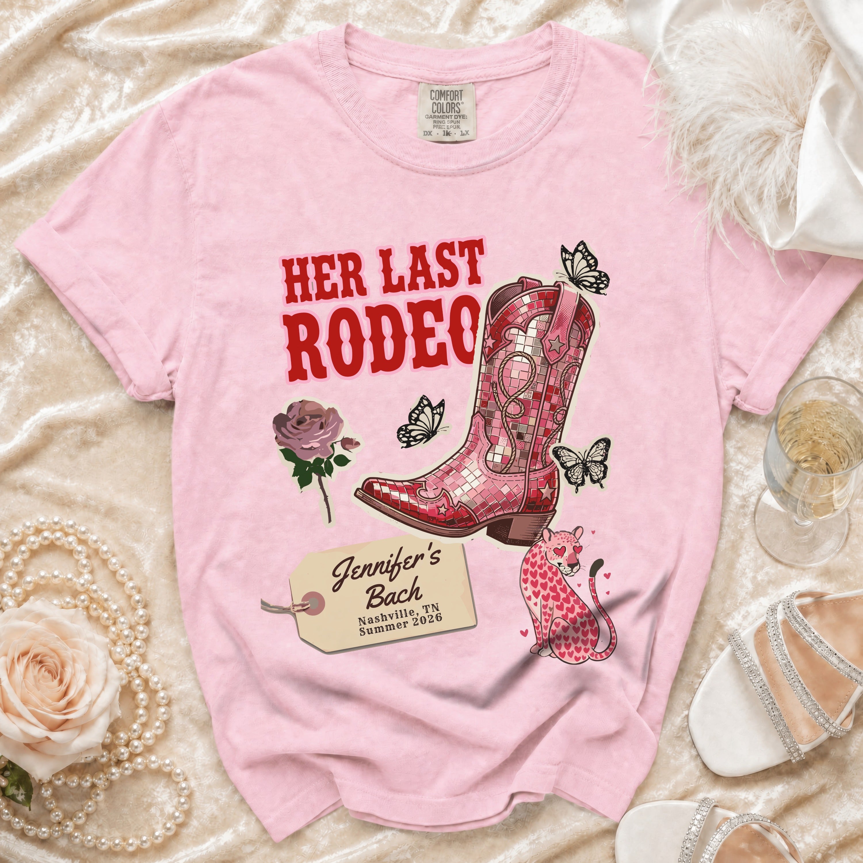 Pink t-shirt with "Her Last Rodeo" and cowboy boot graphic, personalized text.