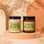 Two candles with text "I PAID FOR ALL OF THIS AND I WOULD DO IT AGAIN."