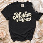 Black t-shirt with "Mother of the Groom!" text in cream font.