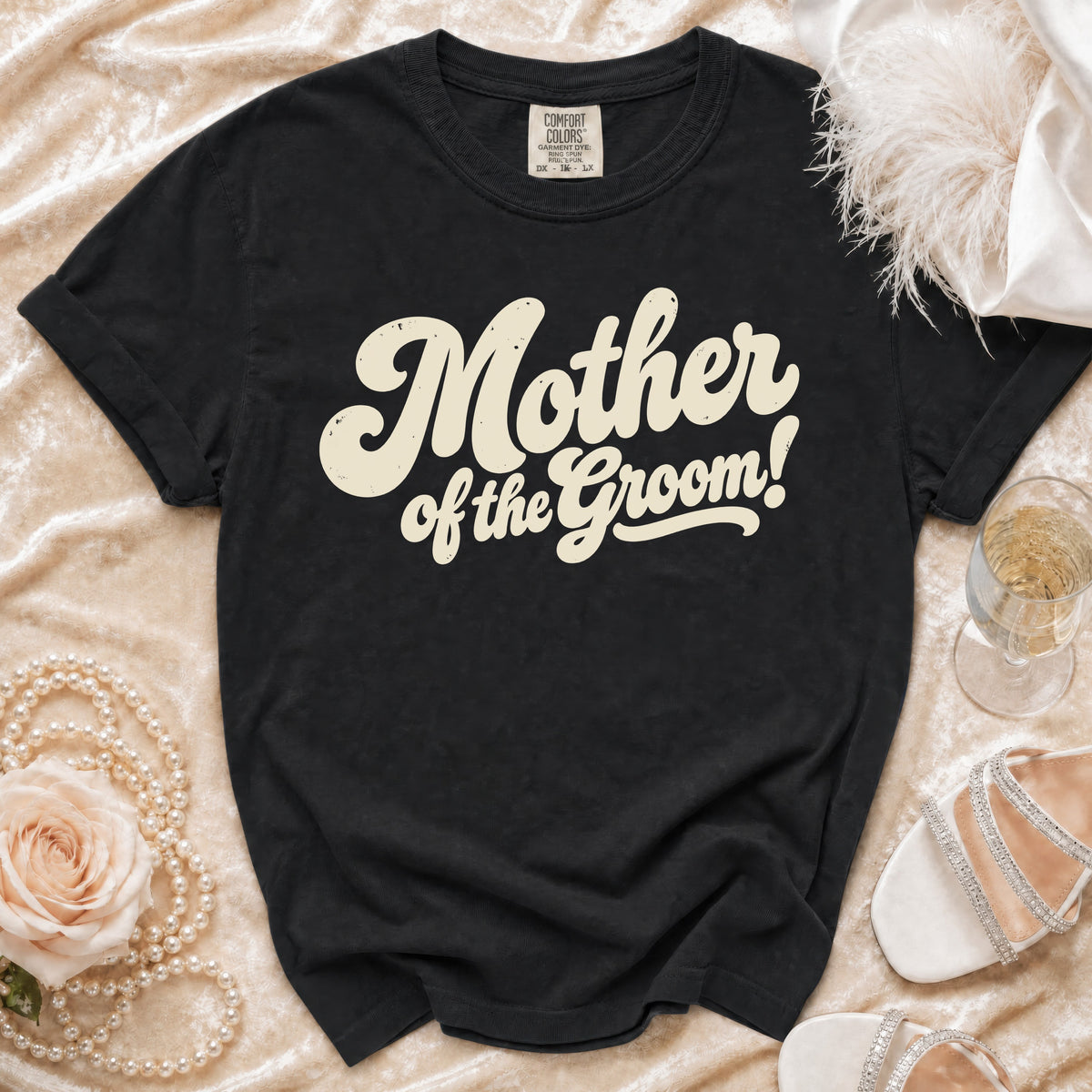 Black t-shirt with "Mother of the Groom!" text in cream font.