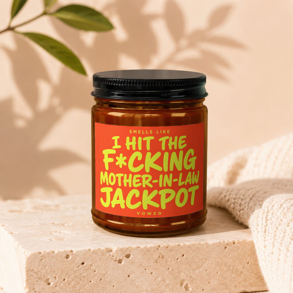Jar with label reading "Smells Like I Hit The F*cking Mother-In-Law Jackpot".