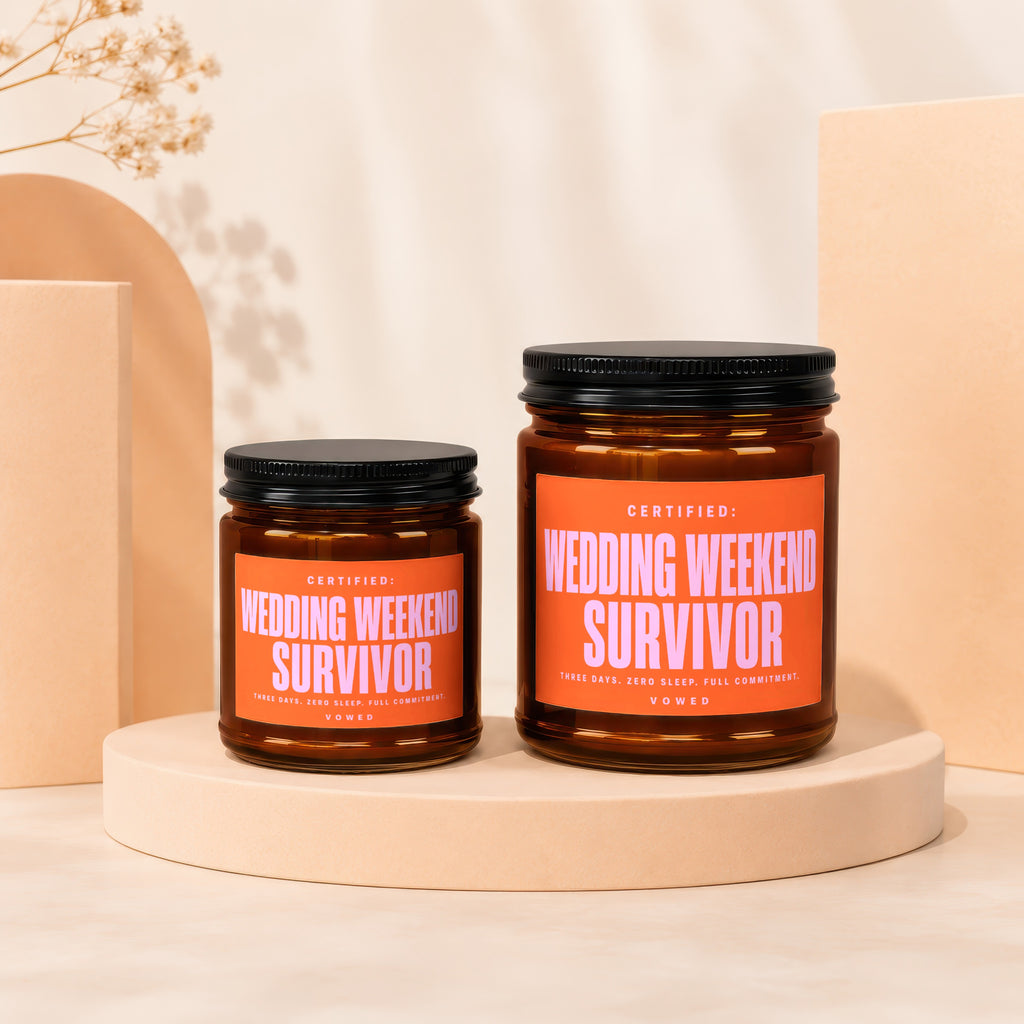 Brown glass jars with orange labels reading "Certified: Wedding Weekend Survivor".
