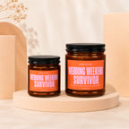 Brown glass jars with orange labels reading "Certified: Wedding Weekend Survivor".