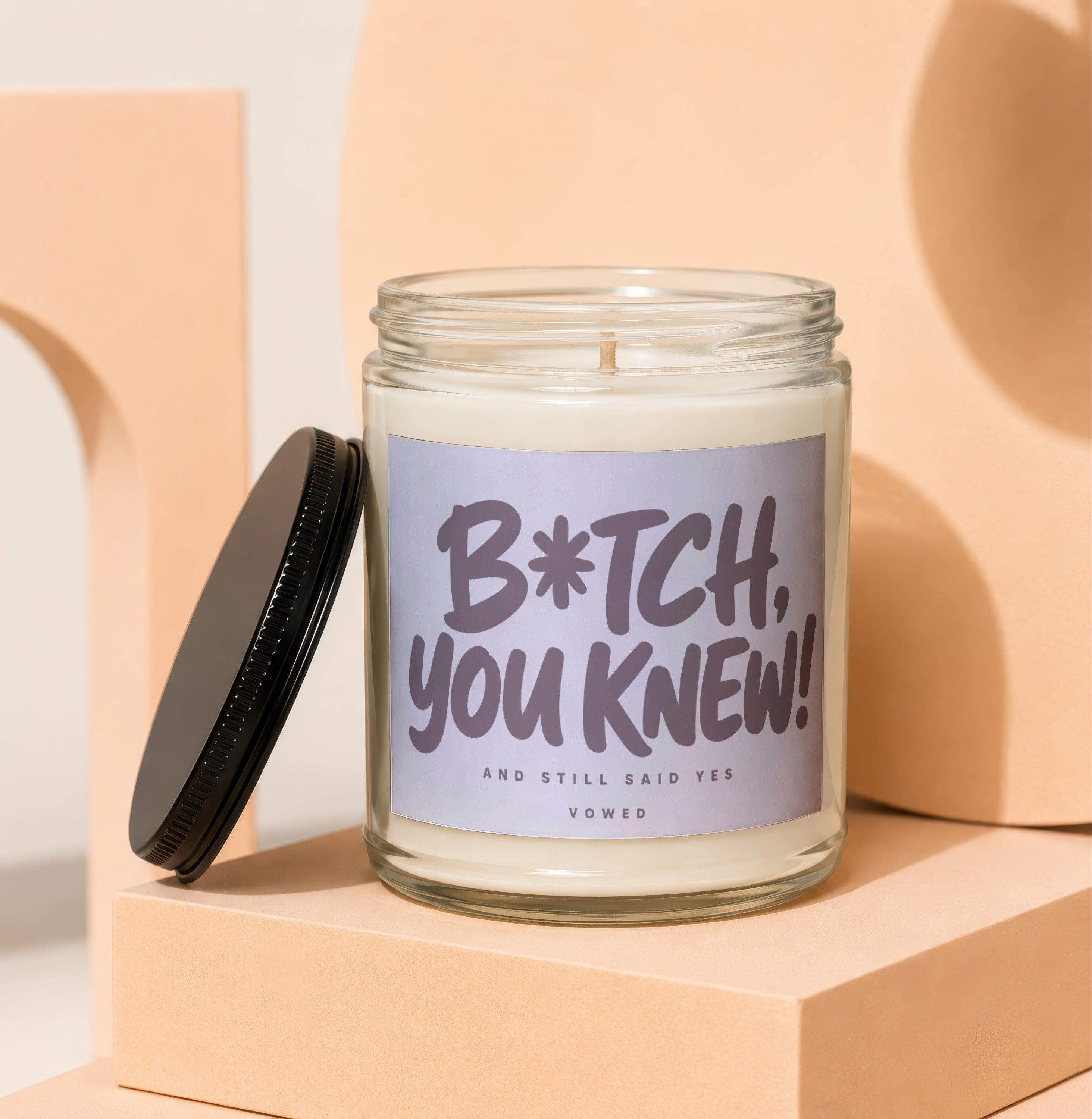 Candle with label: "B*tch, you knew! And still said yes."