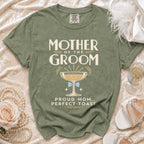 Green t-shirt with "Mother of the Groom" text and champagne glass graphic.