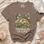 Brown t-shirt with "Toadally In Love" graphic featuring two frogs and wedding veil.