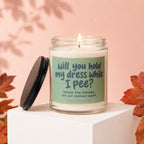Candle with text "will you hold my dress while I pee?" and "Vowed".