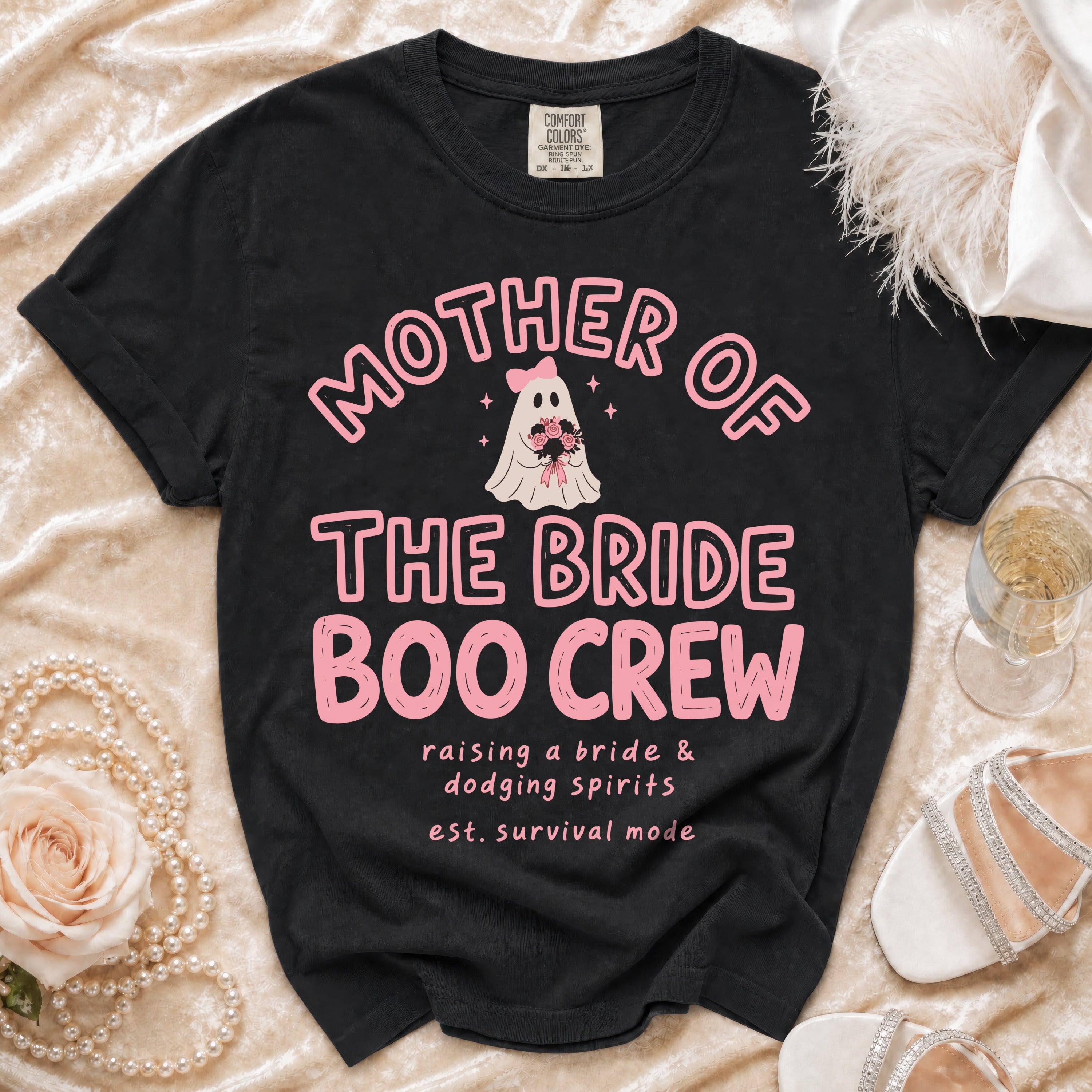 Black t-shirt with pink text: "Mother of the Bride Boo Crew" and a ghost graphic.