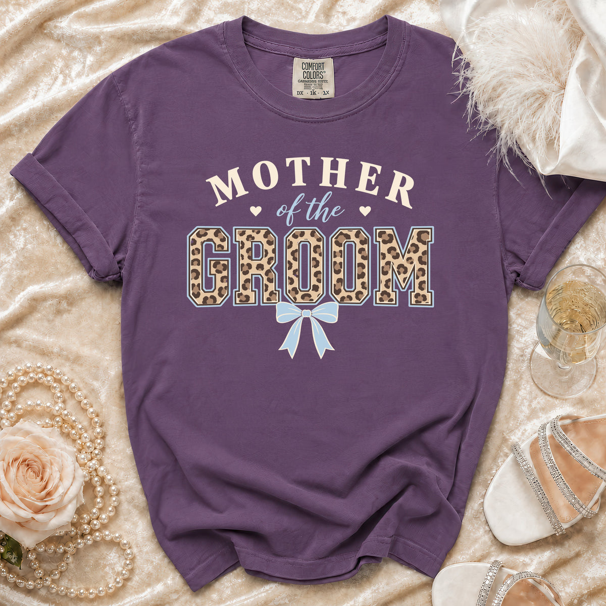 Purple t-shirt with "Mother of the Groom" text and leopard print.