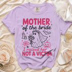 Purple t-shirt with "MOTHER of the bride I raised her NOT A VICTIM" text and ghost bride graphic.