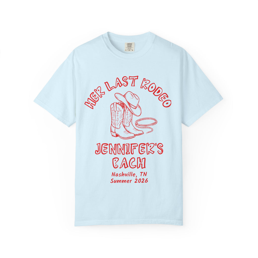 Light blue t-shirt with "Her Last Rodeo" text, cowboy boots, and lasso graphic.