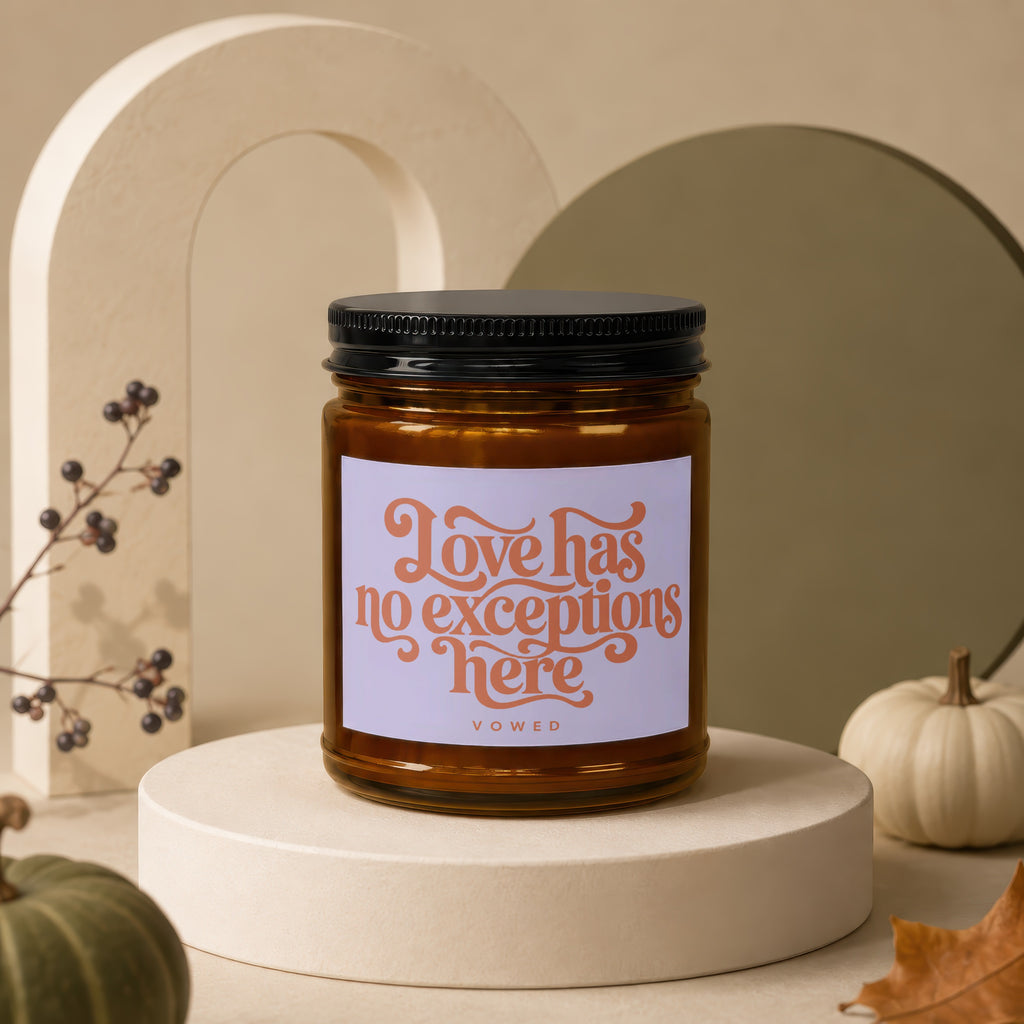 Glass jar candle with label "Love has no exceptions here VOWED."