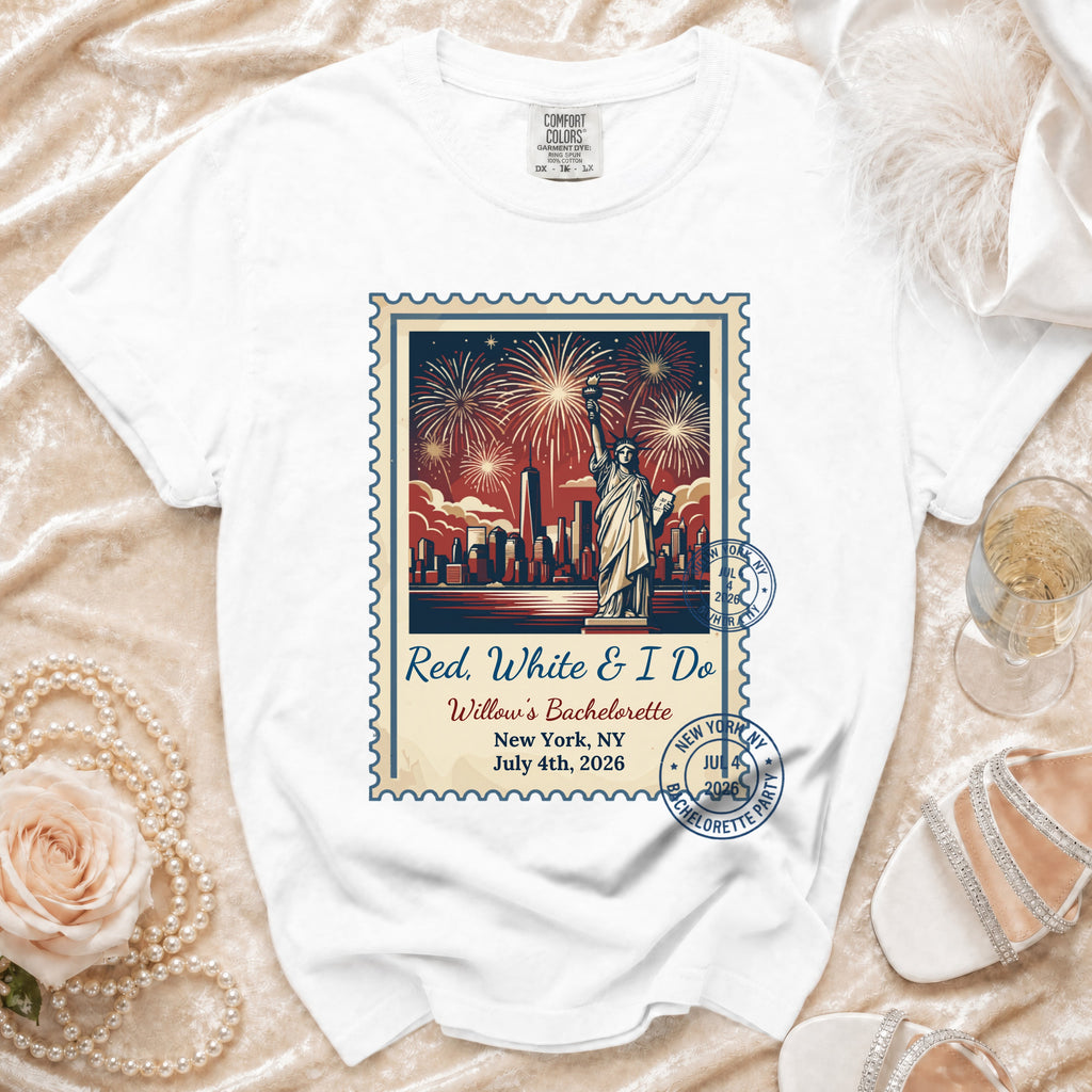 White t-shirt with a stamp graphic featuring the Statue of Liberty and fireworks for a bachelorette party.