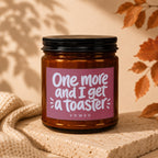 Amber jar candle with text "One more and I get a toaster VOWED".