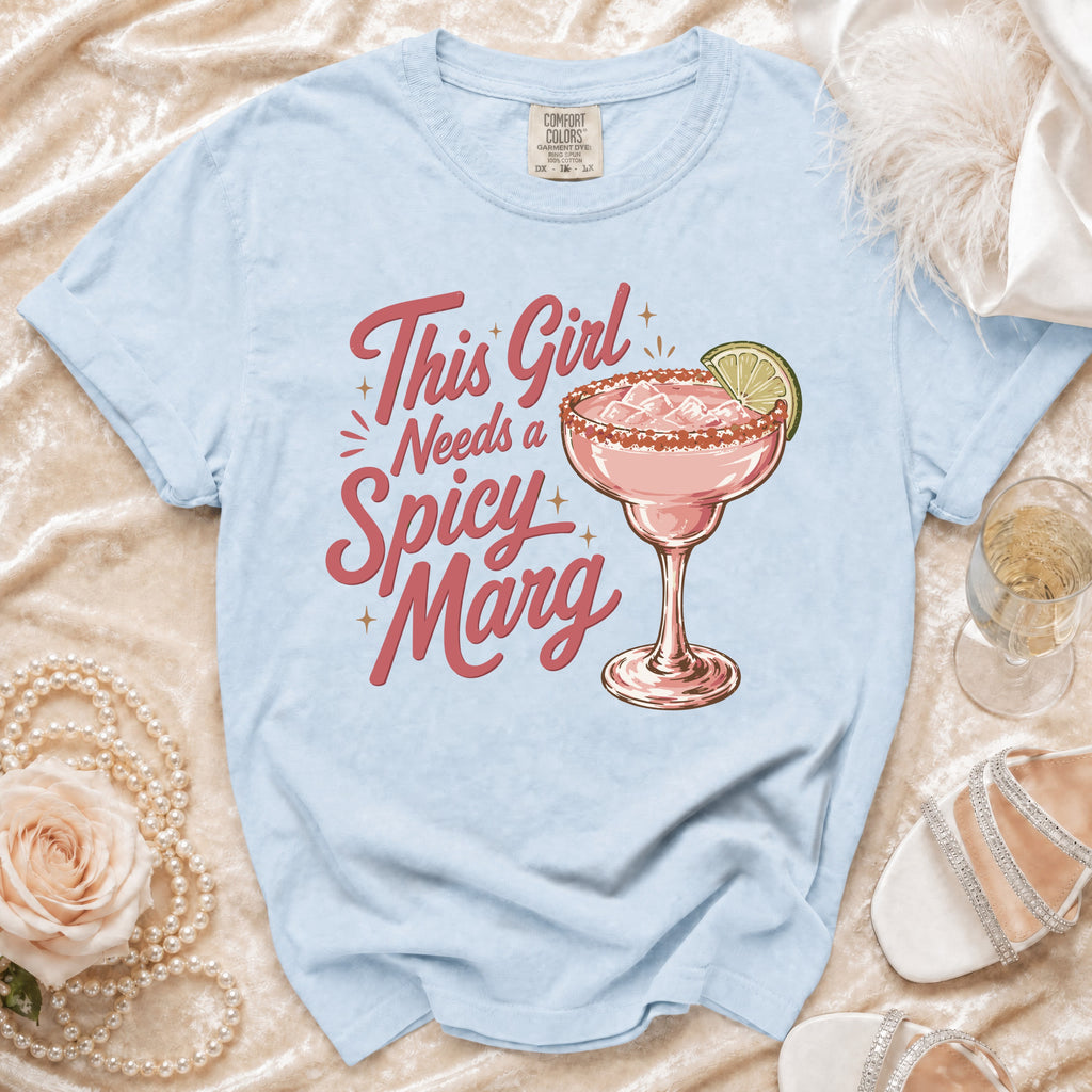Light blue t-shirt with pink text that reads "Spicy Marg."