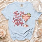 Light blue t-shirt with pink text that reads "Spicy Marg."
