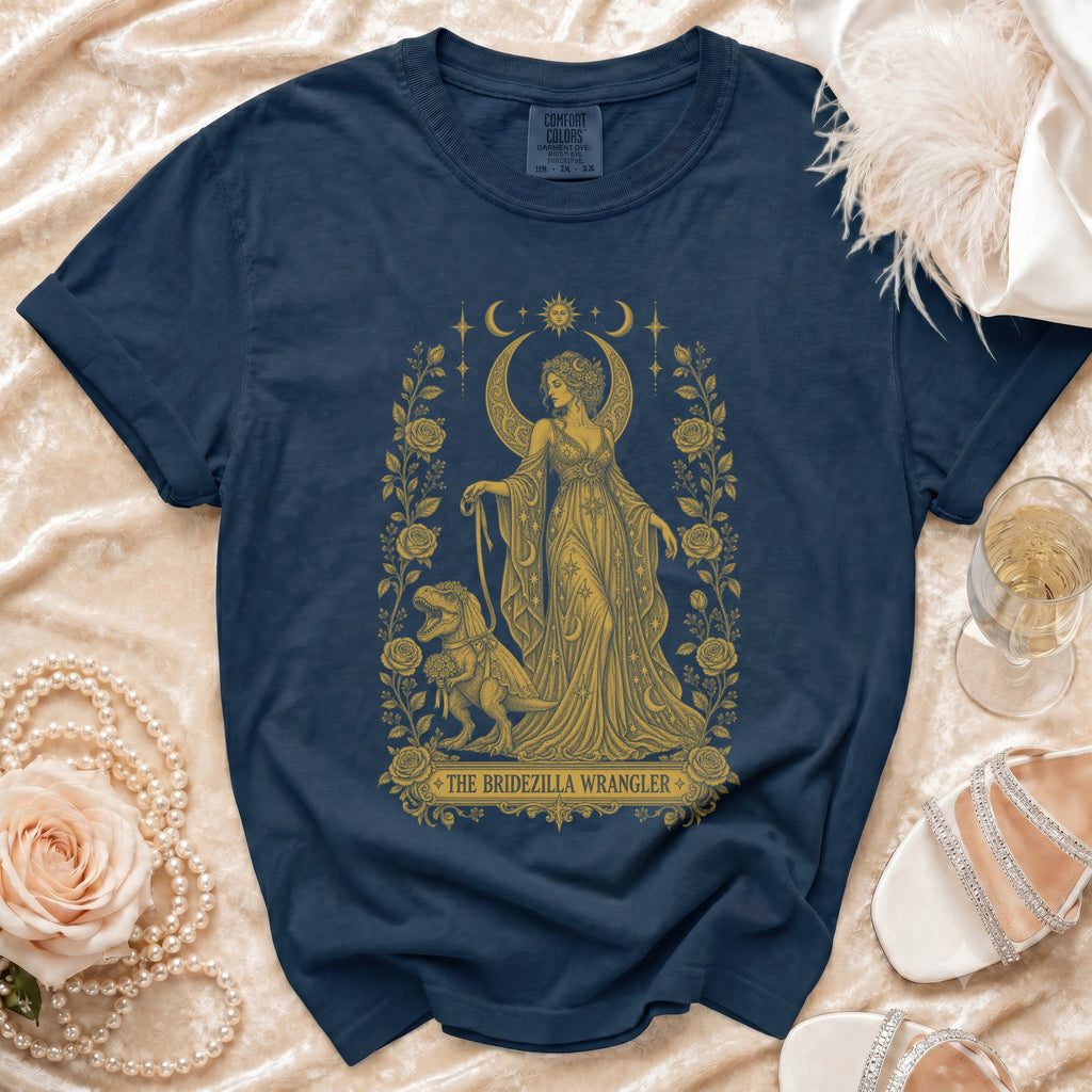 Navy t-shirt with gold celestial bride and dinosaur graphic, "The Bridezilla Wrangler".