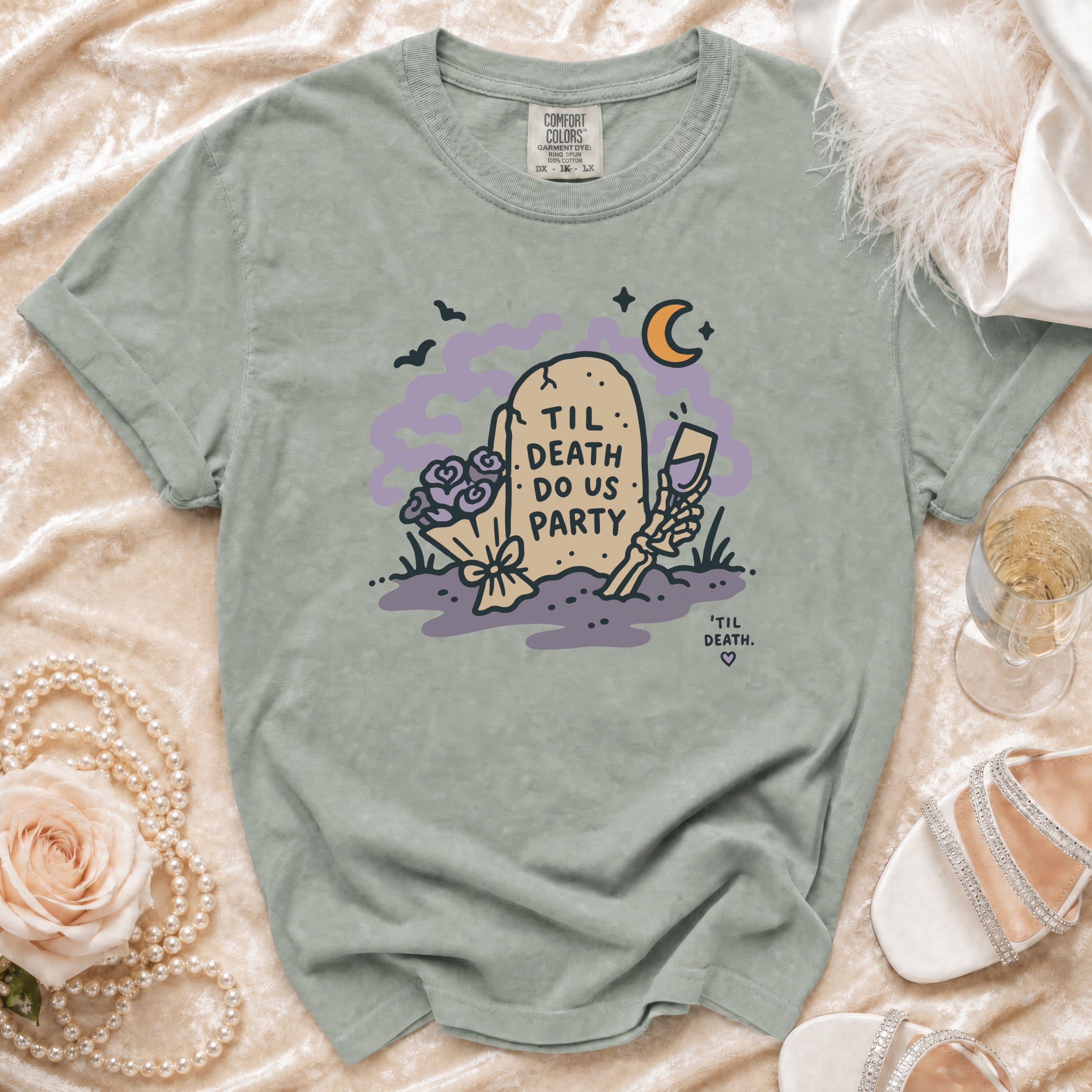 T-shirt with tombstone graphic saying "Til Death Do Us Party."