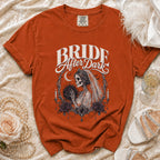 Orange t-shirt with "Bride After Dark" text and a skeleton bride graphic.