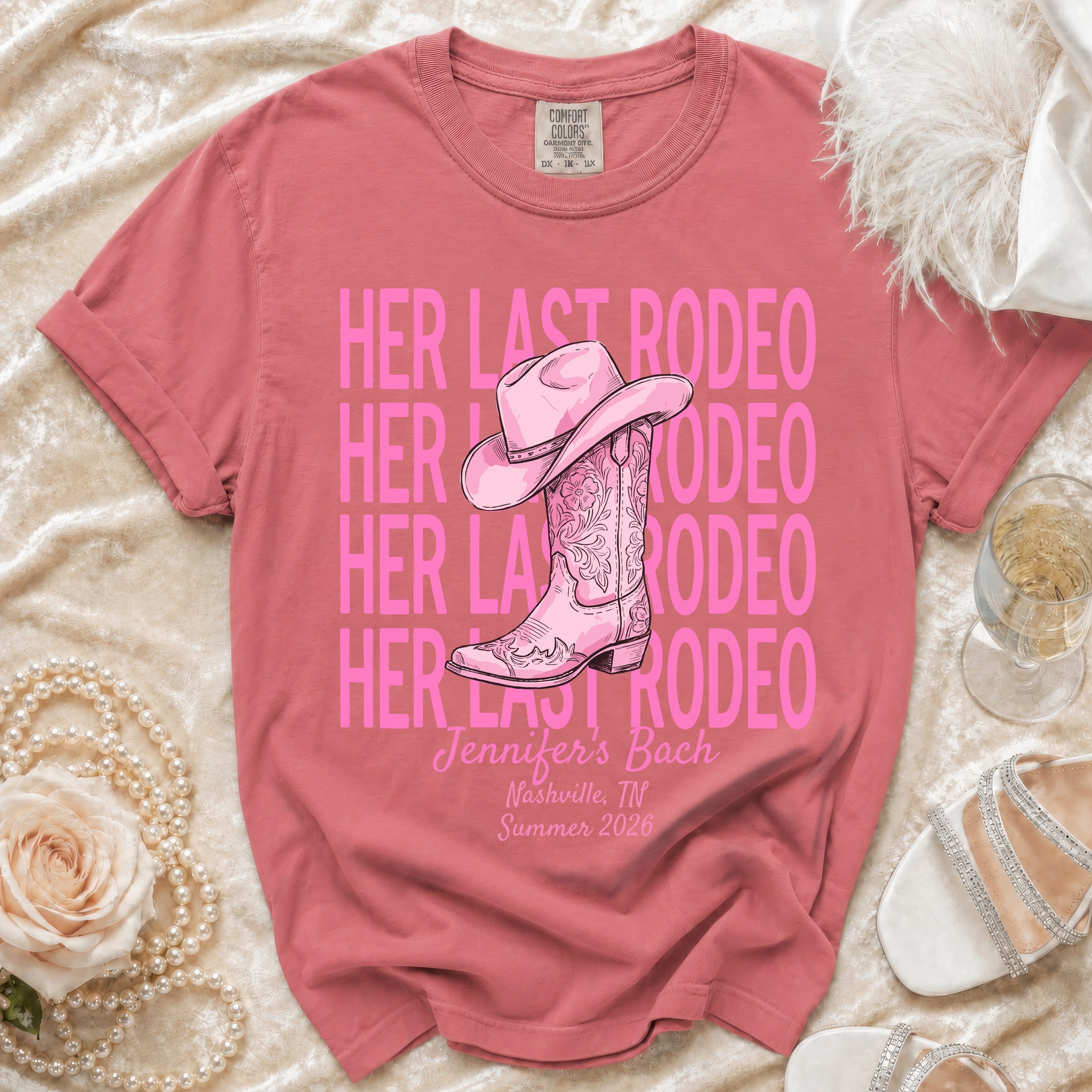Pink t-shirt with "HER LAST RODEO" text and cowboy boot graphic.