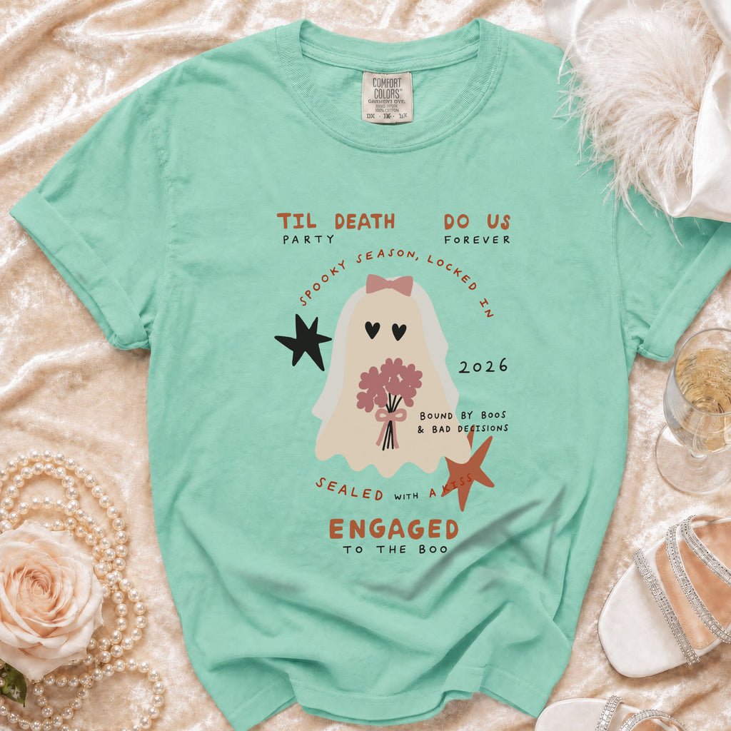 Mint green t-shirt with "Til Death Do Us Forever" ghost graphic and wedding-themed text.