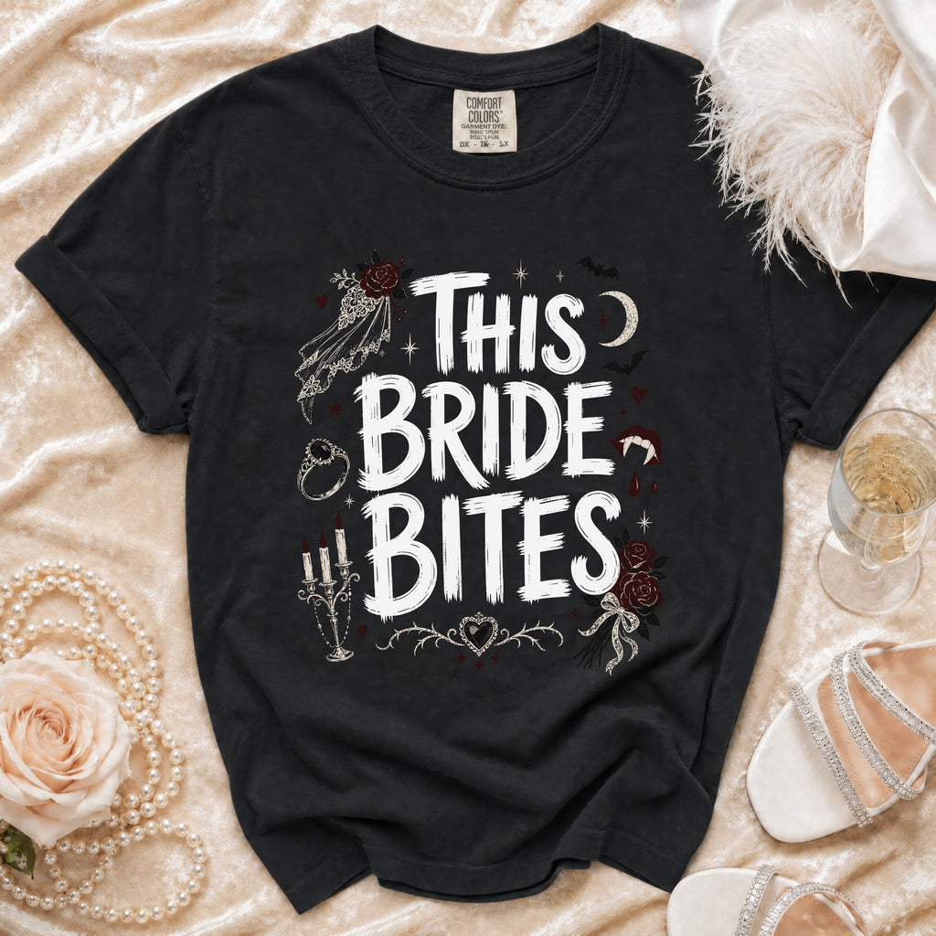 Black t-shirt with "THIS BRIDE BITES" text and gothic wedding graphics.