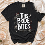 Black t-shirt with "THIS BRIDE BITES" text and gothic wedding graphics.