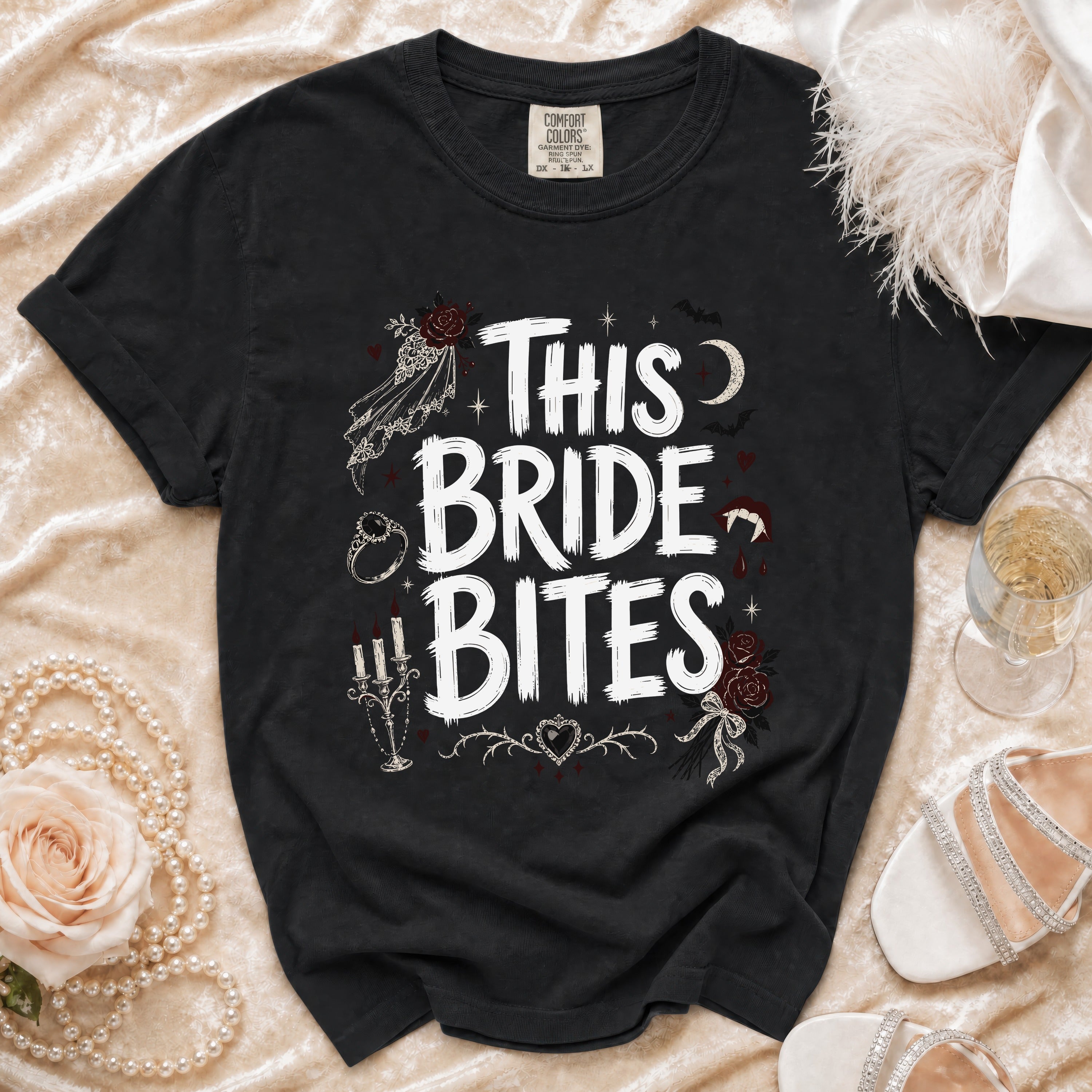 Black t-shirt with "THIS BRIDE BITES" text and gothic wedding graphics.