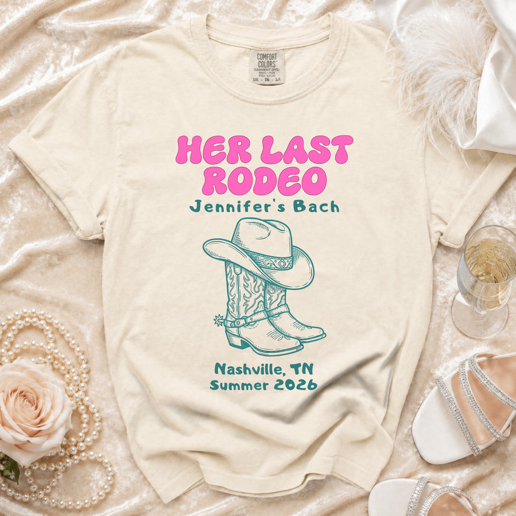 Cream t-shirt with "Her Last Rodeo" and cowboy boots for Jennifer's Bach.
