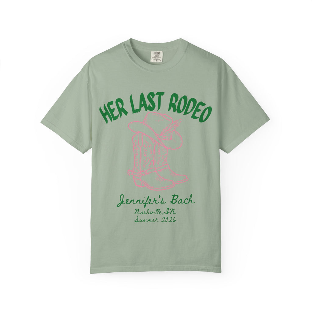 Green t-shirt with "Her Last Rodeo" and boot/hat graphic.
