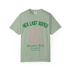 Green t-shirt with "Her Last Rodeo" and boot/hat graphic.