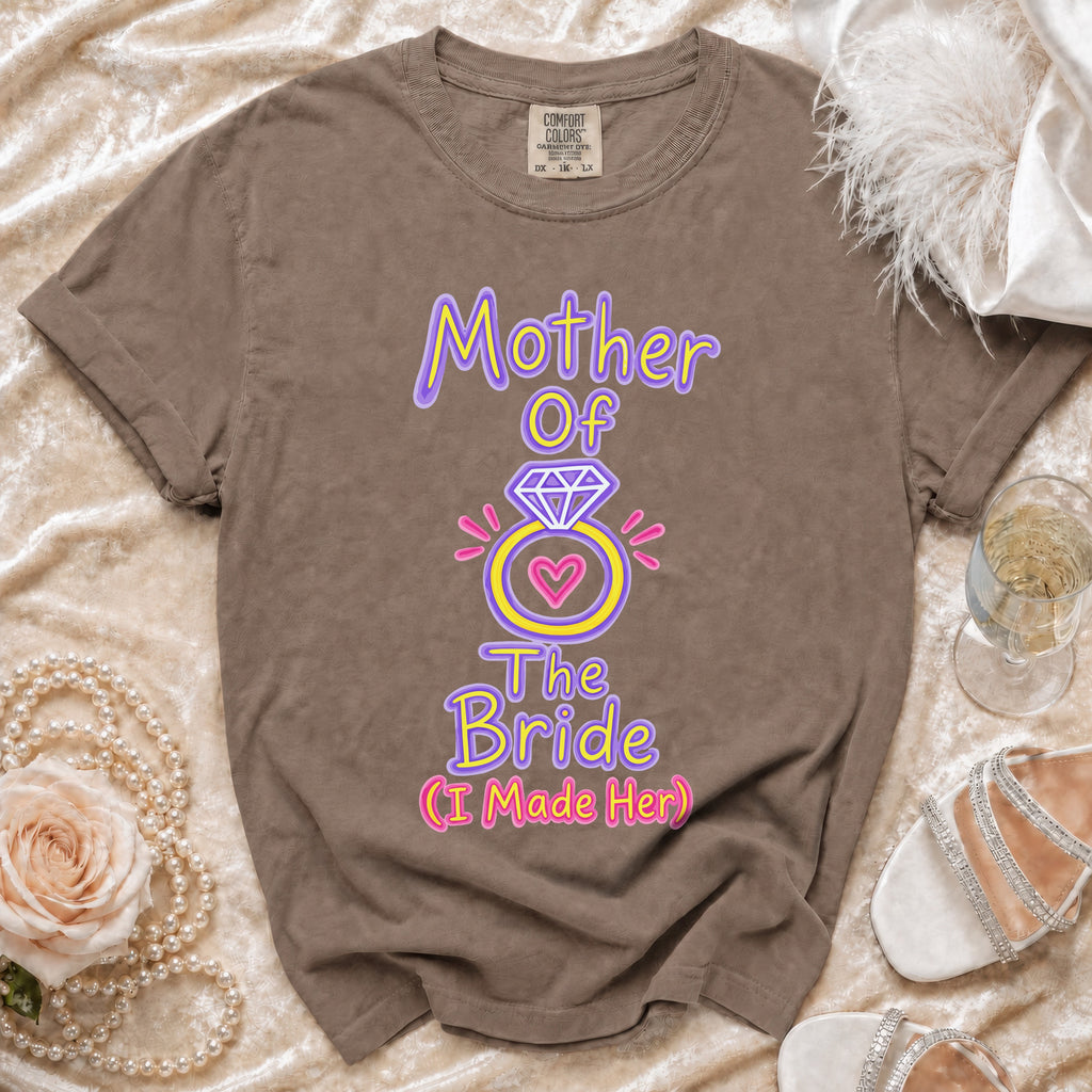 Taupe t-shirt with "Mother Of The Bride (I Made Her)" graphic and diamond ring.