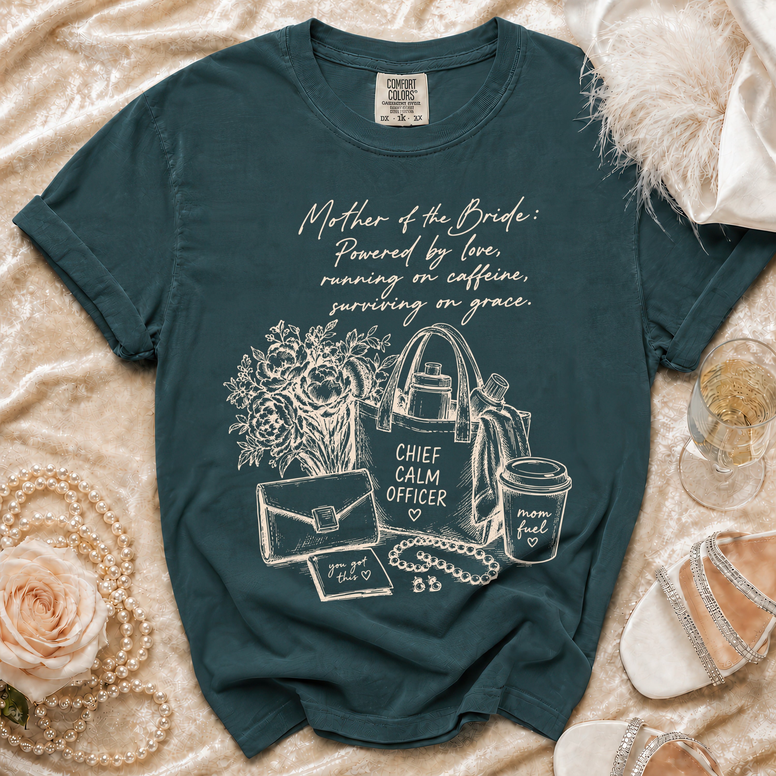 Teal t-shirt with "Mother of the Bride" quote and "Chief Calm Officer" text.