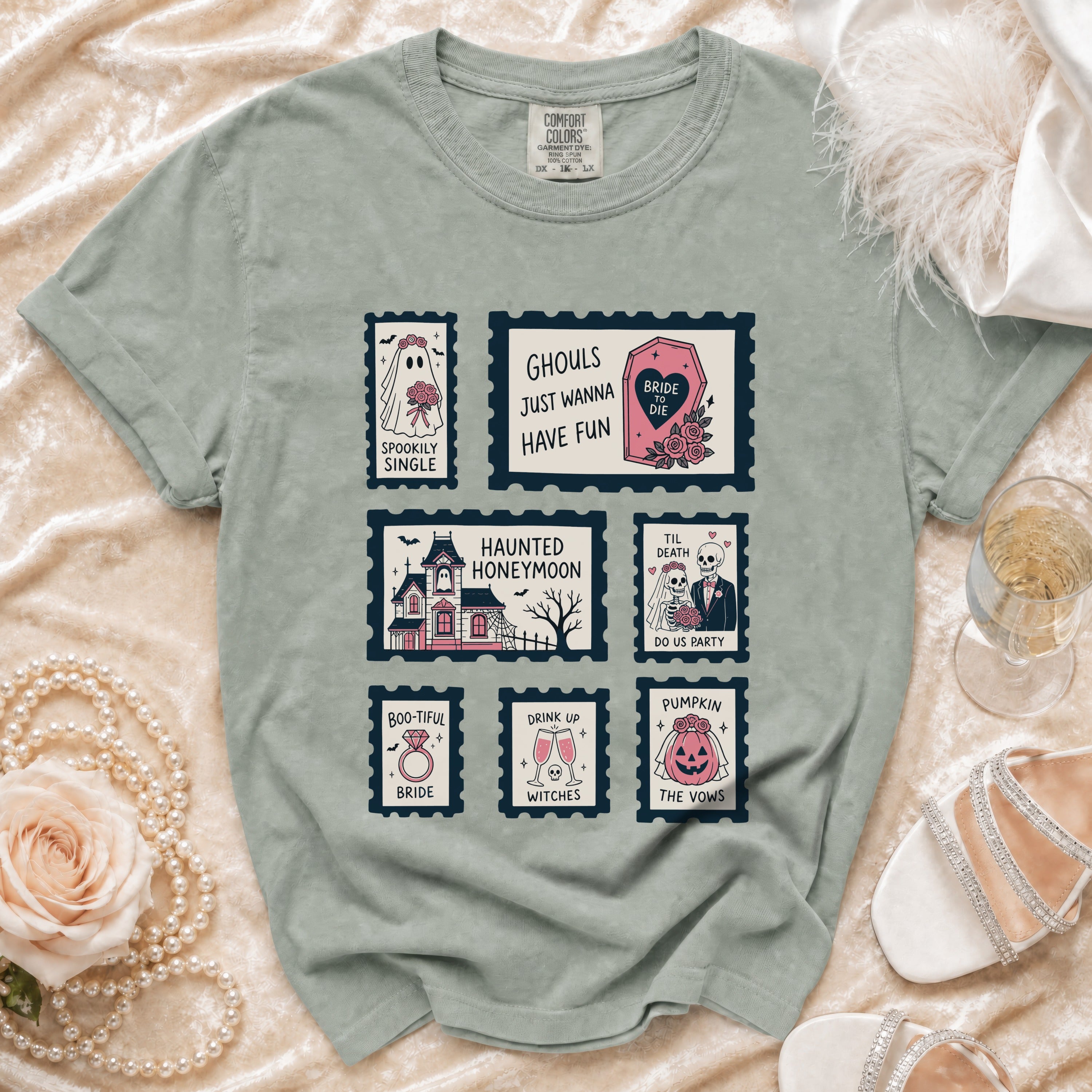 Green t-shirt with spooky wedding themed stamps: "Spookily Single", "Ghouls Just Wanna Have Fun", "Haunted Honeymoon", "Til Death Do Us Party", "Boo-tiful Bride", "Drink Up Witches", and "Pumpkin The Vows".