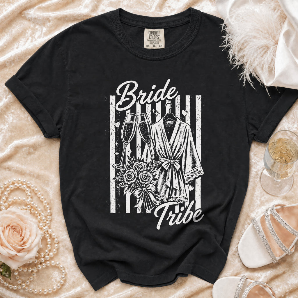 Black t-shirt with "Bride Tribe" graphic featuring champagne glasses, robe, and flowers.