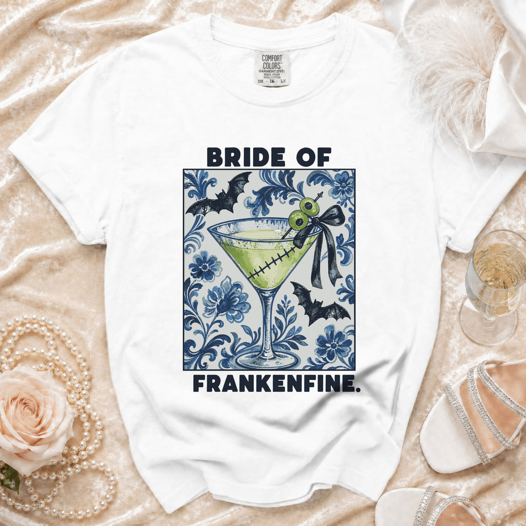 White t-shirt with "Bride of Frankenfine" text and a martini glass graphic.