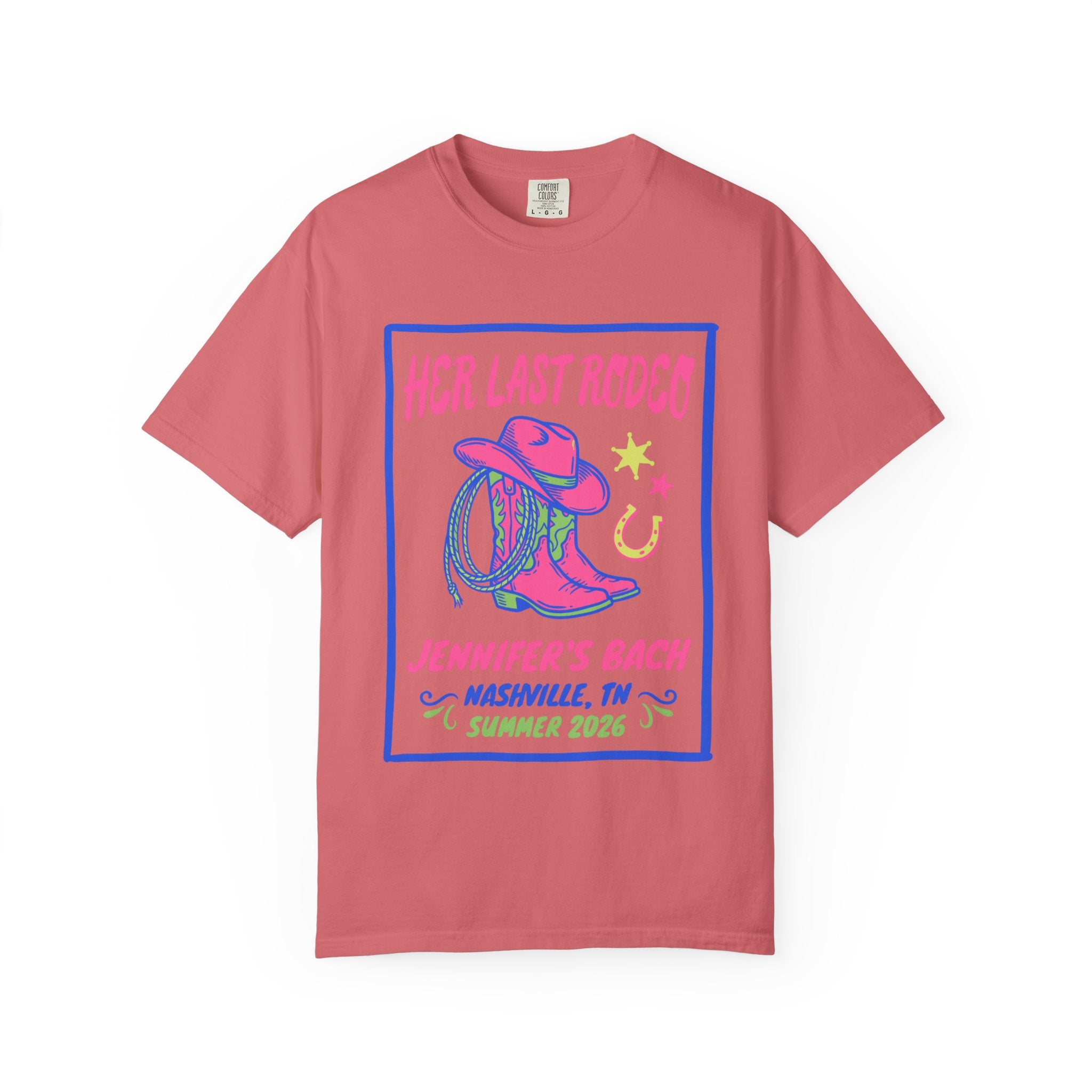 Pink t-shirt with "Her Last Rodeo" text, cowboy boots, and horseshoe graphic.
