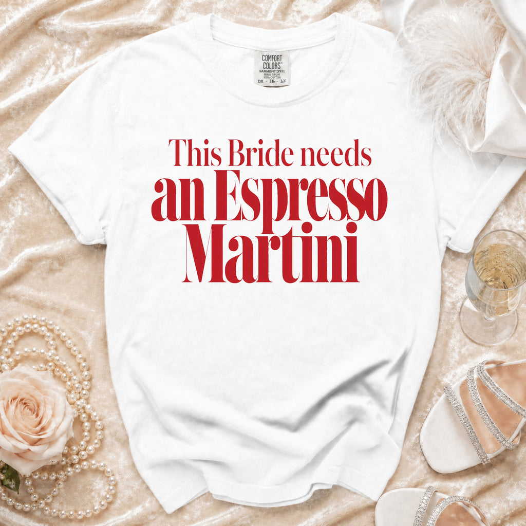 White Comfort Colors t-shirt with red text: "This Bride needs an Espresso Martini".