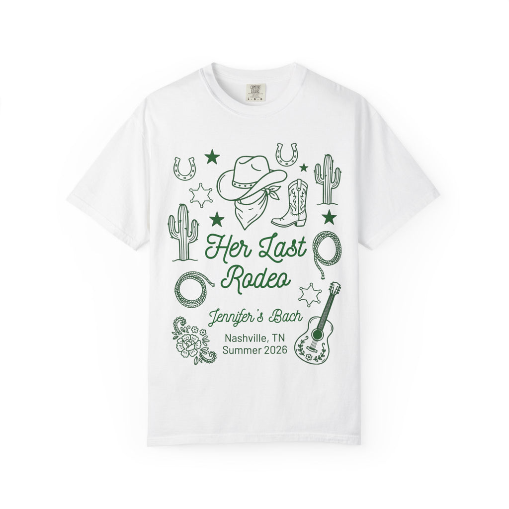 White t-shirt with "Her Last Rodeo" text, cowboy hat, boots, cactus, lasso, and guitar.