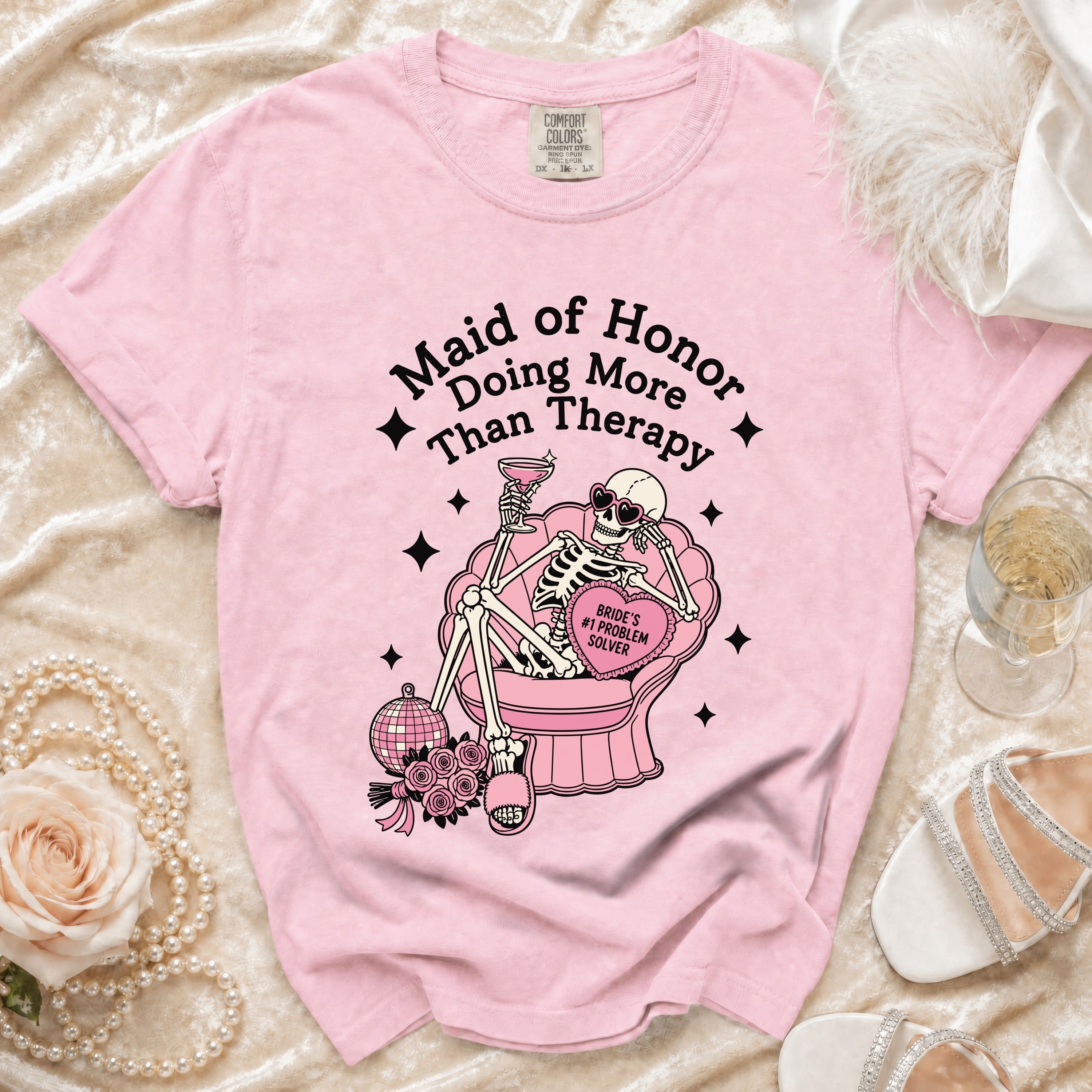 Pink t-shirt with skeleton graphic: "Maid of Honor Doing More Than Therapy" and "Bride's #1 Problem Solver".