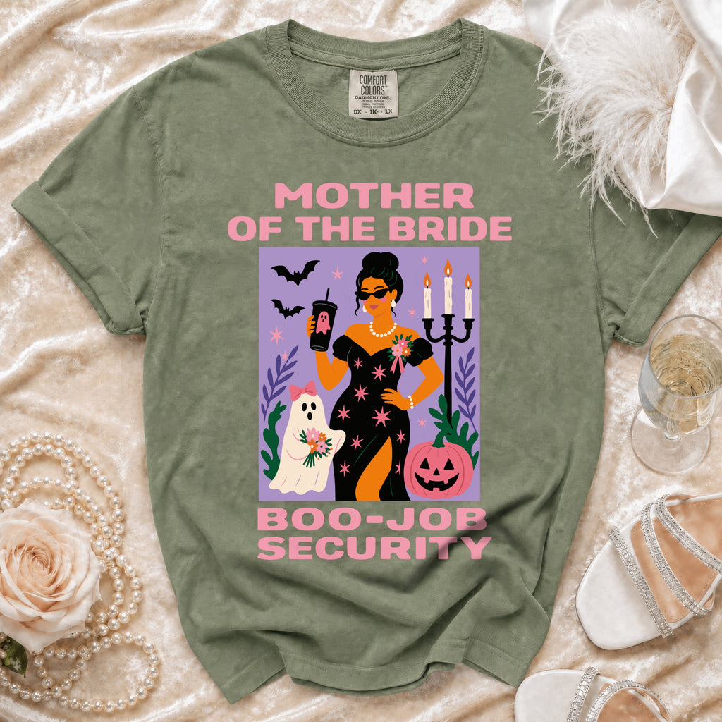 Green t-shirt with "Mother of the Bride Boo-Job Security" Halloween graphic.