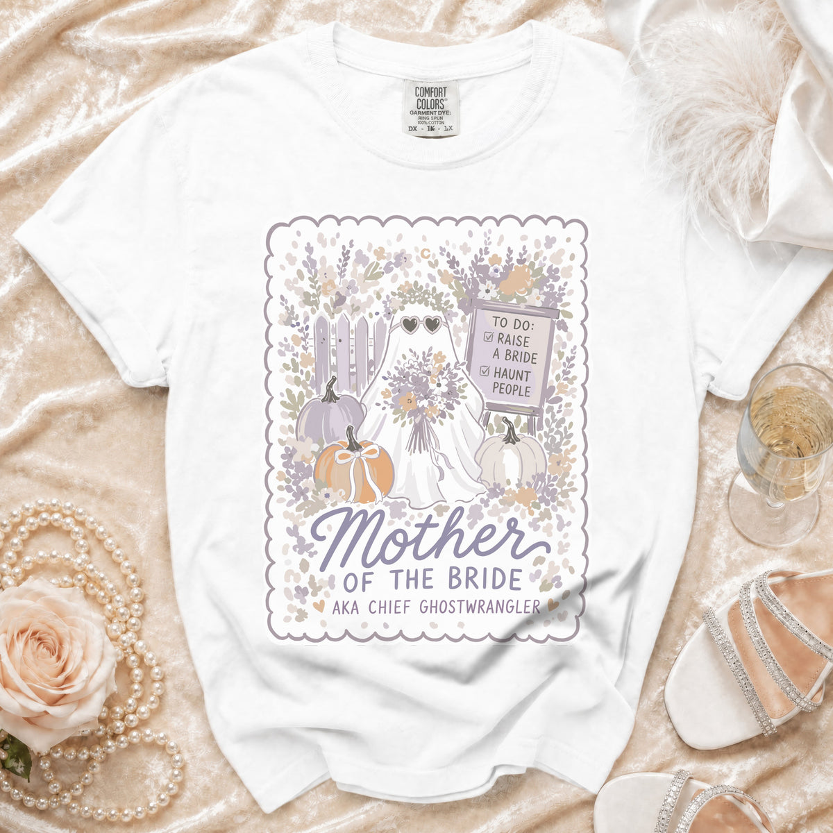 White t-shirt with ghost bride graphic, pumpkins, and text "Mother of the Bride".